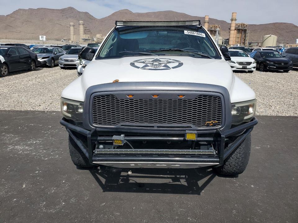 Photo 5 from auction – 2002 DODGE RAM 1500 with VIN 1D7HA18Z62J162954