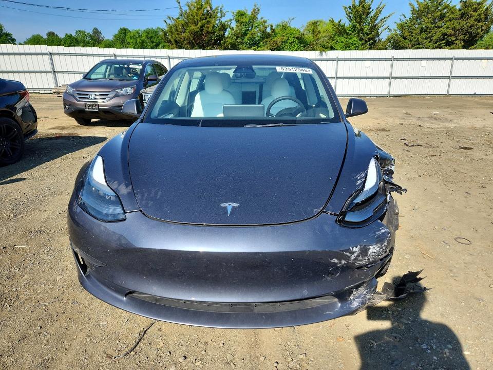 Photo 5 from auction – 2022 TESLA MODEL 3 with VIN 5YJ3E1EB4NF203190