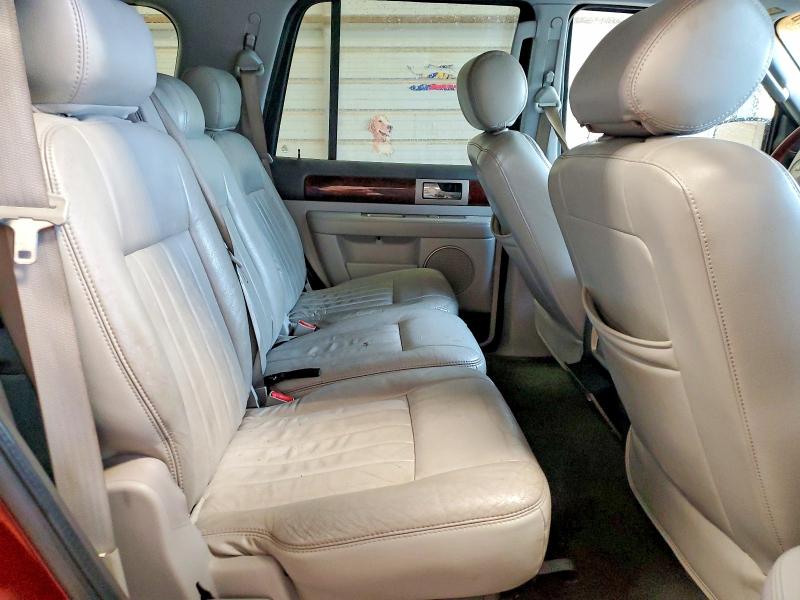 Photo 11 from auction – 2004 LINCOLN NAVIGATOR with VIN 5LMFU28RX4LJ34623