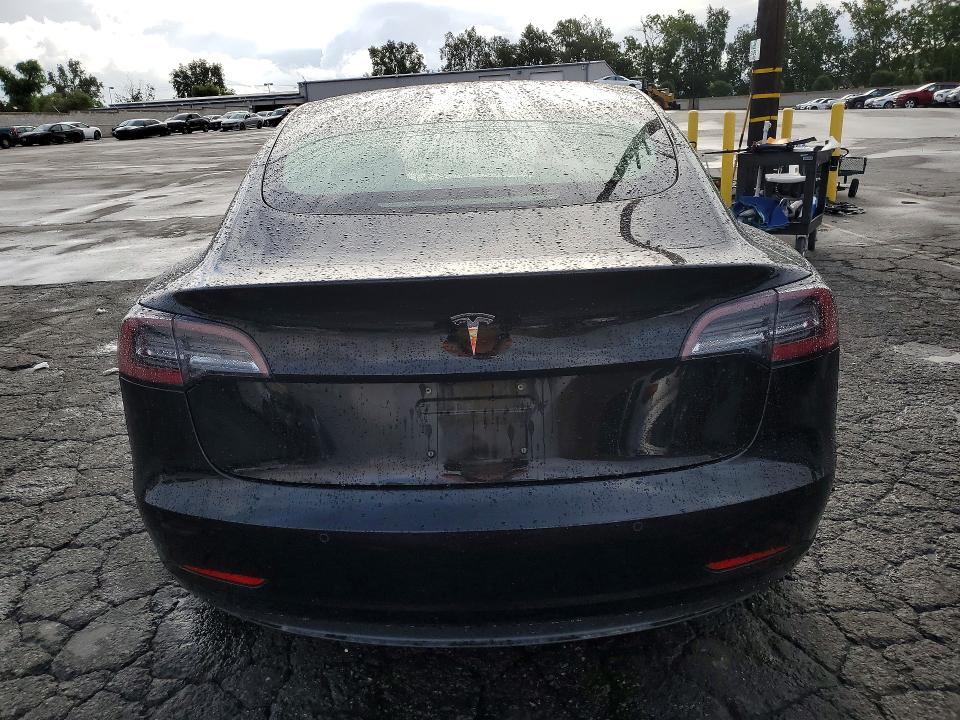 Снимка 6 от търг – 2018 TESLA MODEL 3 с VIN 5YJ3E1EA9JF156353