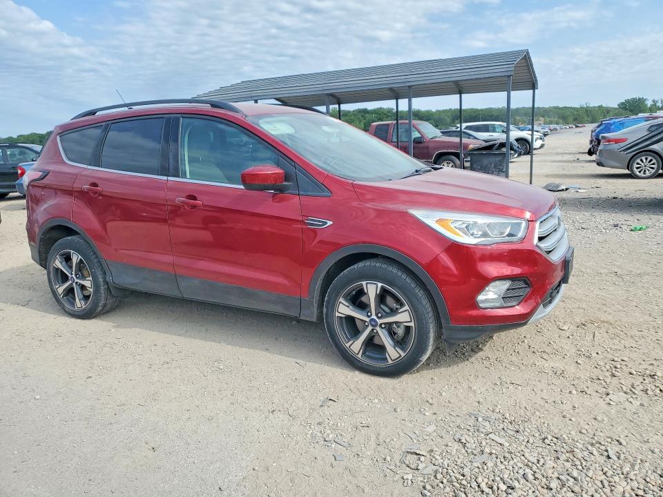 Photo 4 from auction – 2018 FORD ESCAPE with VIN 1FMCU9HD1JUD43919