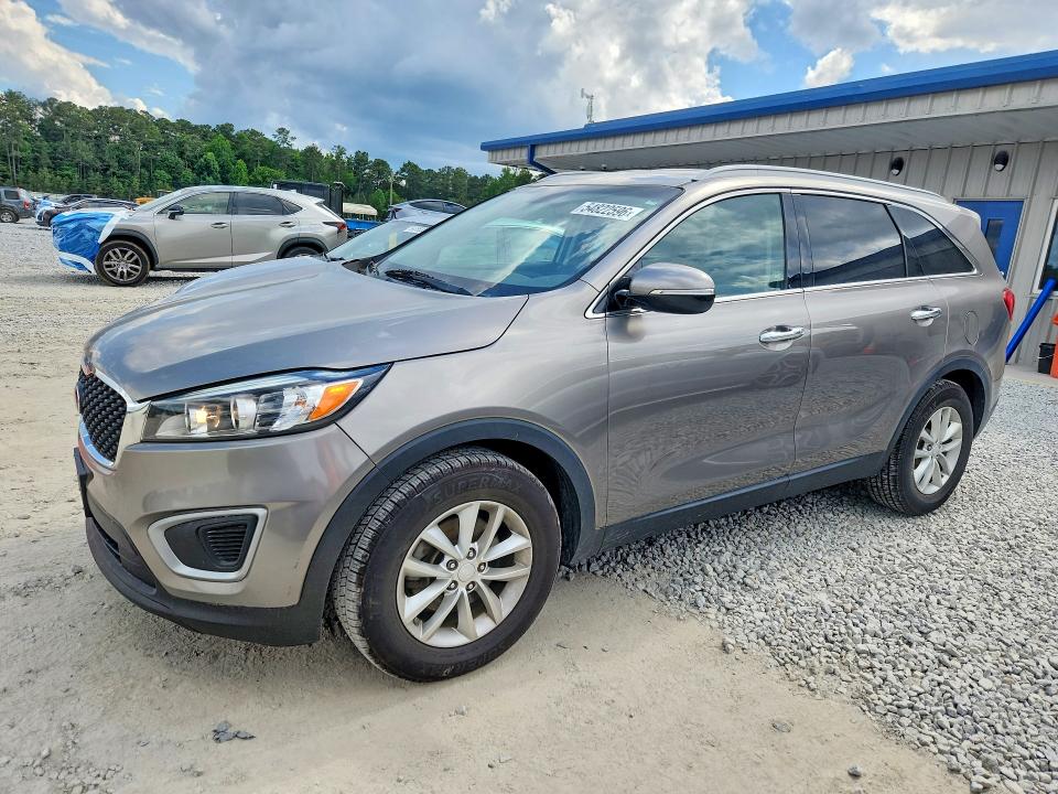 KIA SORENTO 2016 with VIN 5XYPG4A37GG004867 - Photo from auction