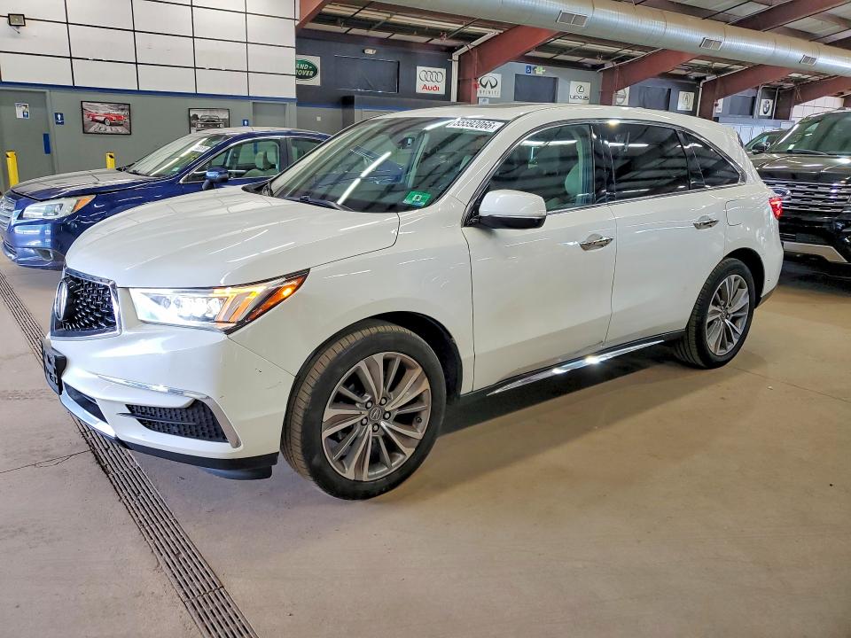 ACURA MDX 2018 with VIN 5J8YD4H57JL028832 - Photo from auction