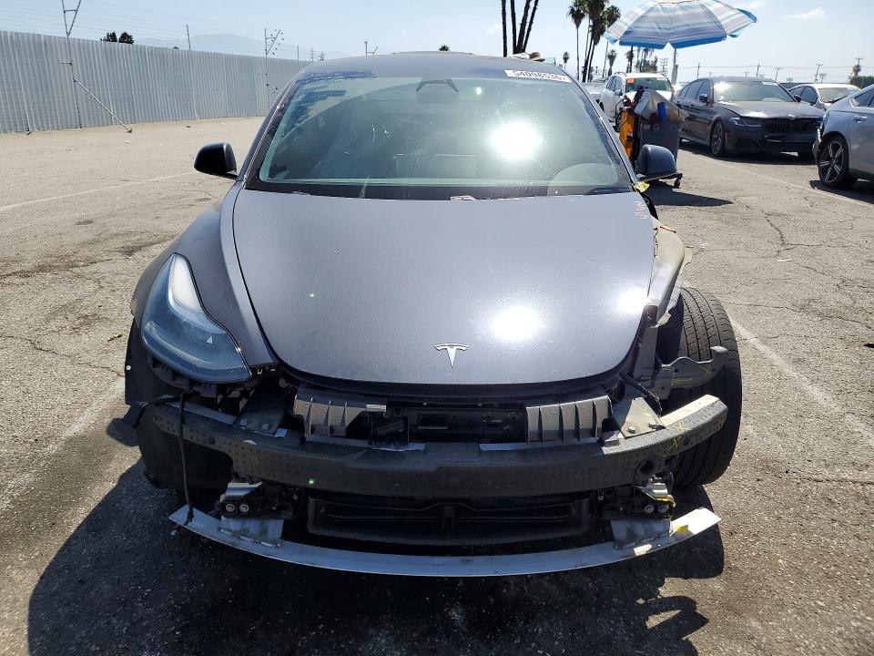 Photo 5 from auction – 2021 TESLA MODEL 3 with VIN 5YJ3E1EB0MF072046