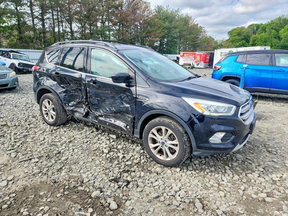 Photo 4 from auction – 2017 FORD ESCAPE with VIN 1FMCU9G91HUD71632