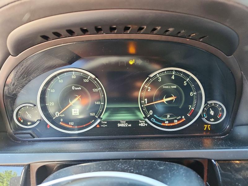 Photo 9 from auction – 2014 BMW 750 with VIN WBAYF8C50ED653819