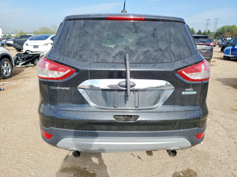 Photo 6 from auction – 2013 FORD ESCAPE with VIN 1FMCU0H91DUD03108
