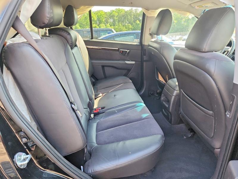 Photo 11 from auction – 2012 HYUNDAI SANTA FE with VIN 5XYZHDAG2CG120657