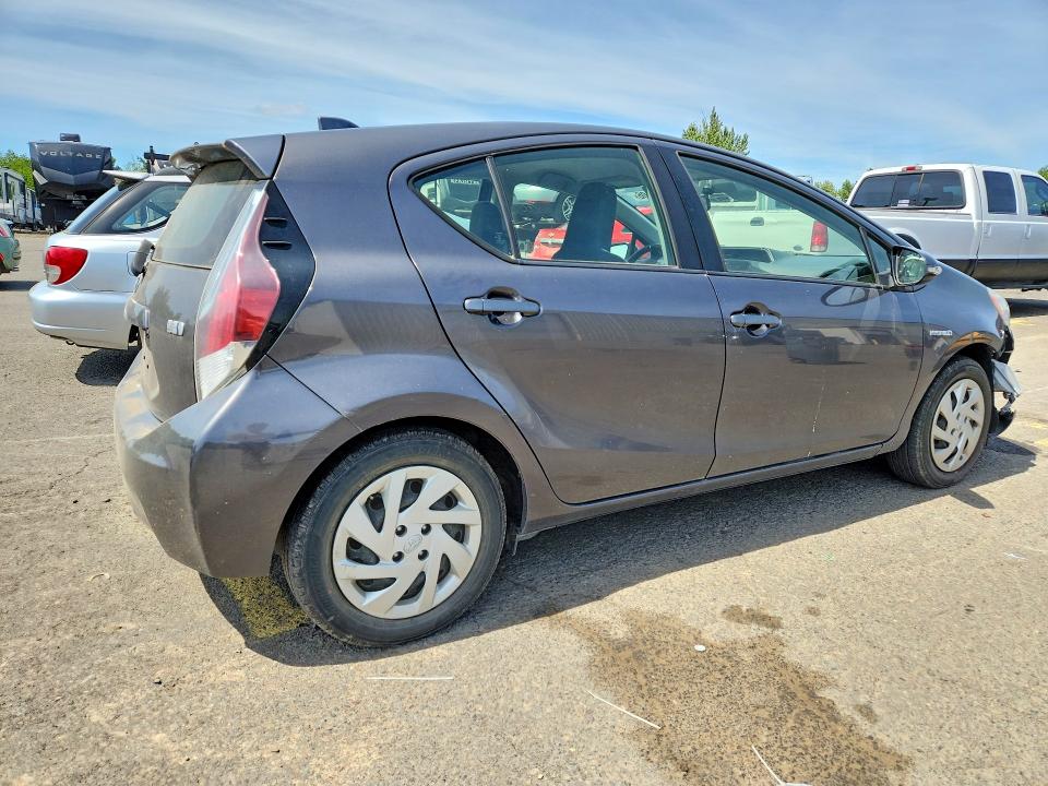 Photo 3 from auction – 2015 TOYOTA PRIUS C with VIN JTDKDTB38F1579411