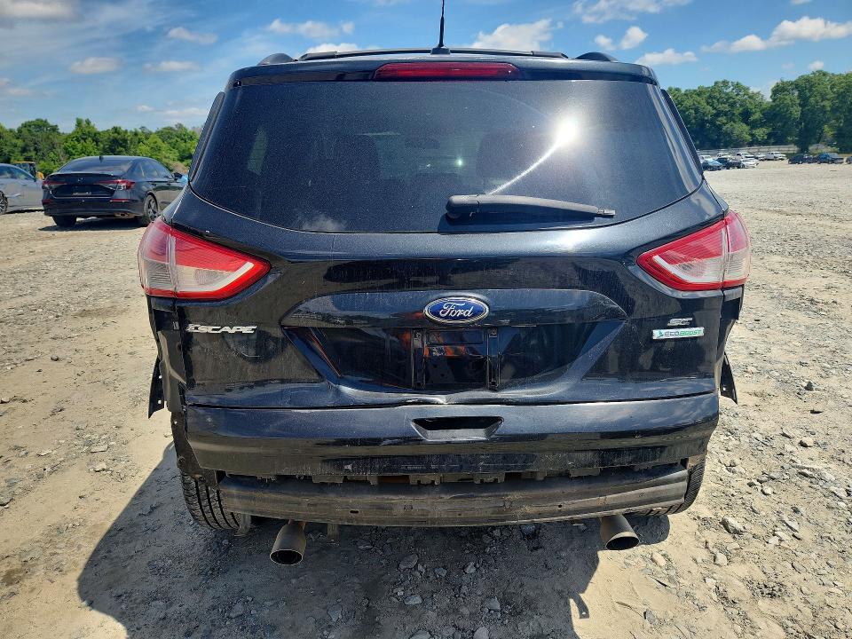Photo 6 from auction – 2013 FORD ESCAPE with VIN 1FMCU0GX8DUD90909