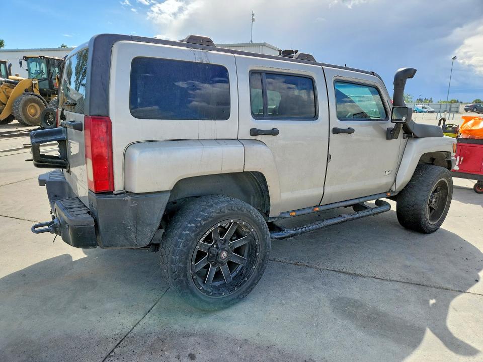 Photo 3 from auction – 2009 HUMMER H3 with VIN 5GTEN13E598118296