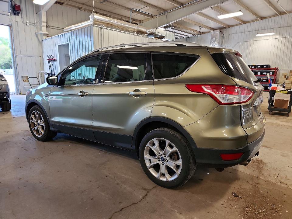 Photo 2 from auction – 2014 FORD ESCAPE with VIN 1FMCU9JX6EUA13610