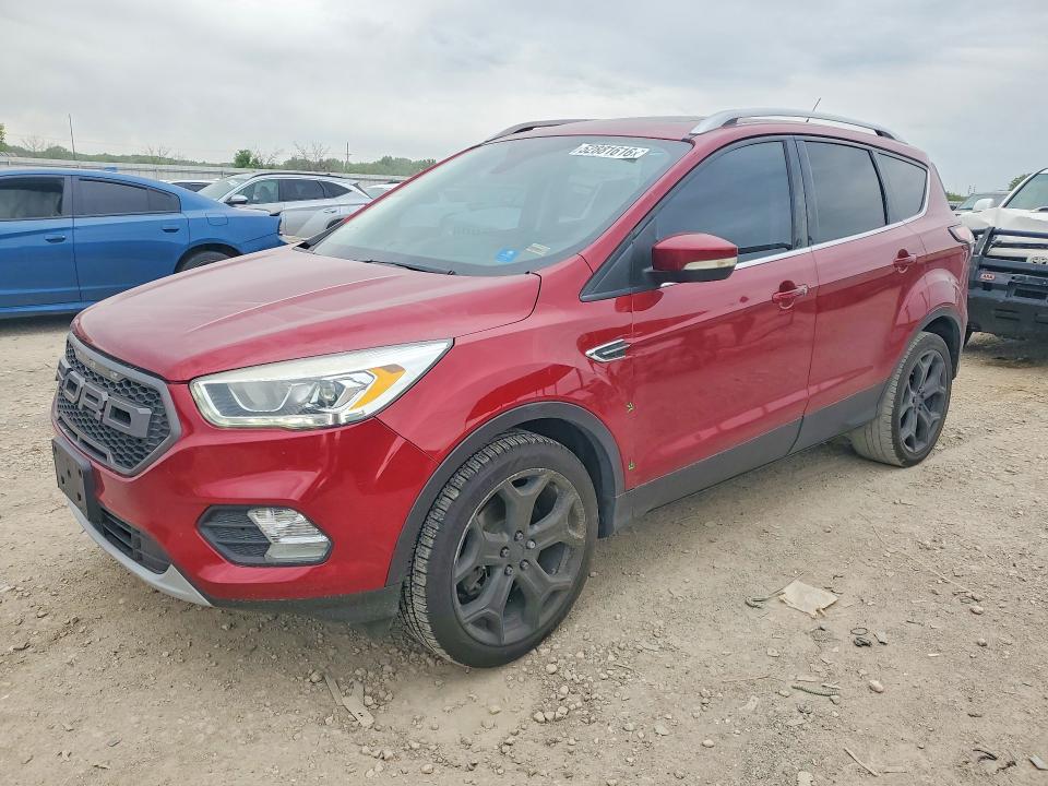 FORD ESCAPE 2017 with VIN 1FMCU9J91HUC25112 - Photo from auction