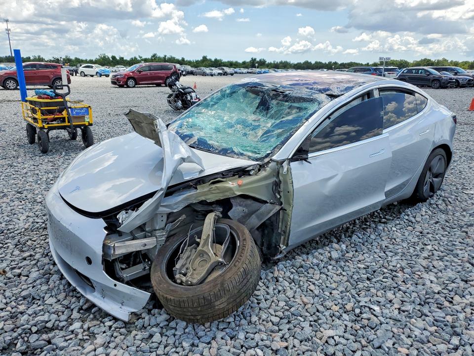 TESLA MODEL 3 2018 with VIN 5YJ3E1EA0JF037476 - Photo from auction
