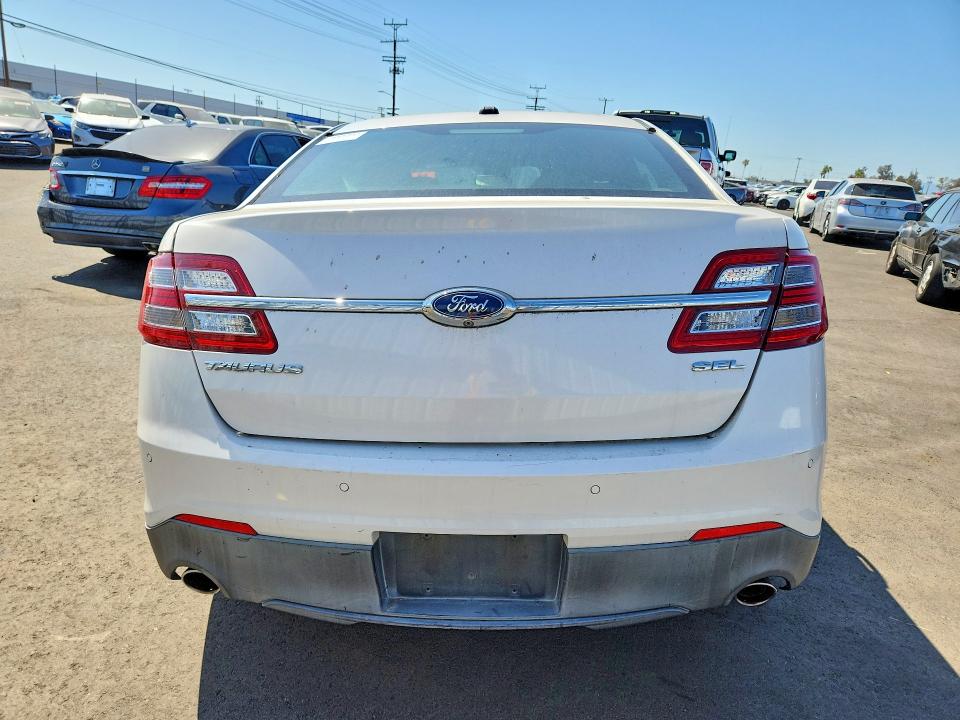 Photo 6 from auction – 2015 FORD TAURUS with VIN 1FAHP2E87FG135443