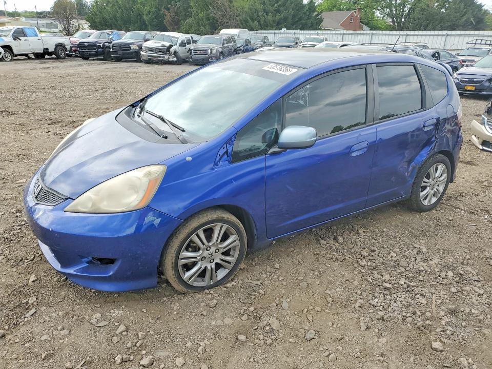 HONDA FIT 2009 with VIN JHMGE88439C005810 - Photo from auction
