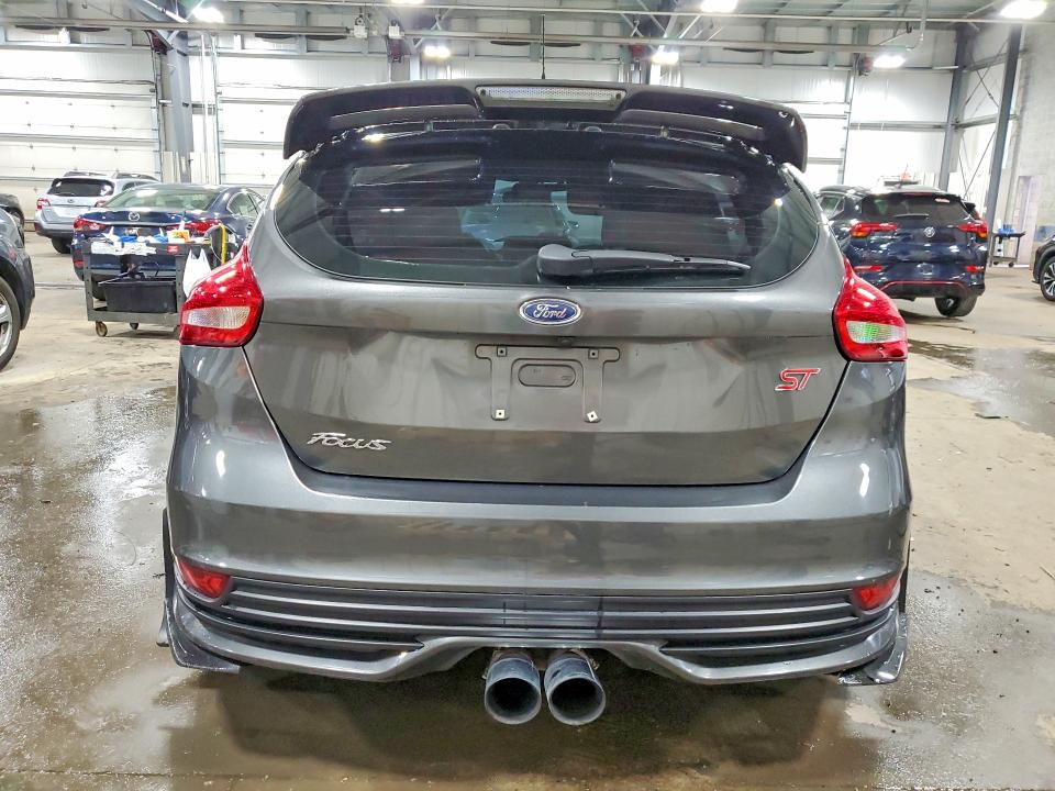 Photo 6 from auction – 2015 FORD FOCUS with VIN 1FADP3L96FL356054