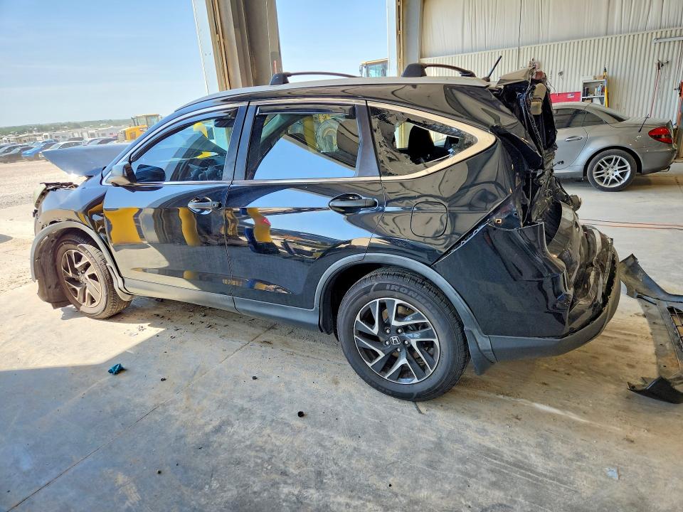 Photo 2 from auction – 2016 HONDA CR-V with VIN 5J6RM4H49GL043183