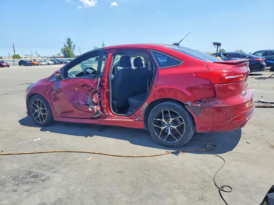 Photo 2 from auction – 2016 FORD FOCUS with VIN 1FADP3F24GL376836