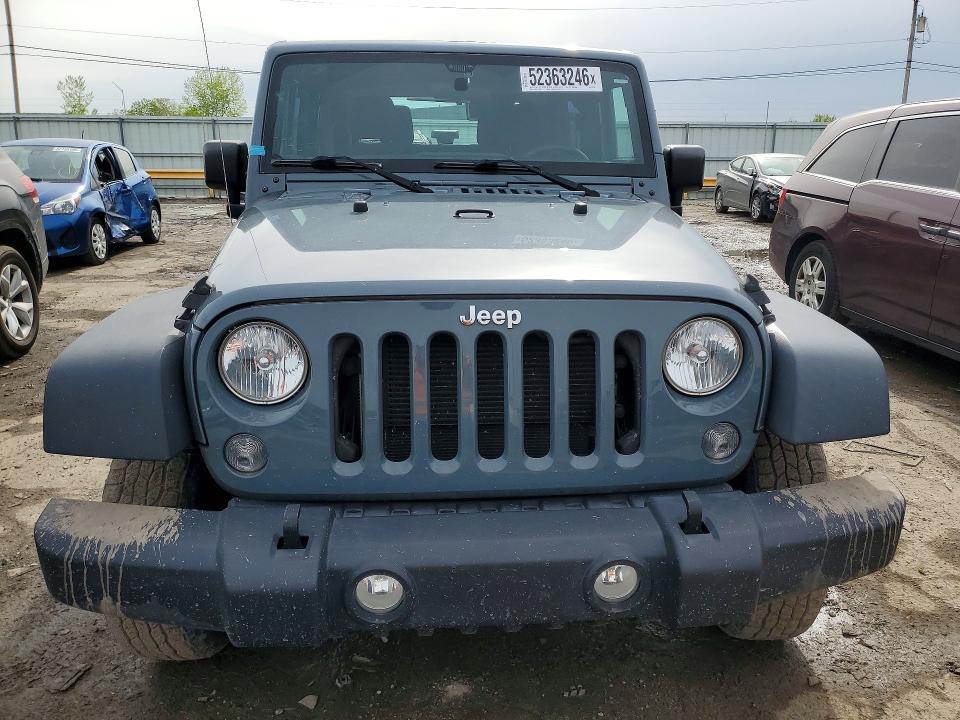 Photo 5 from auction – 2015 JEEP WRANGLER with VIN 1C4AJWAG0FL721135