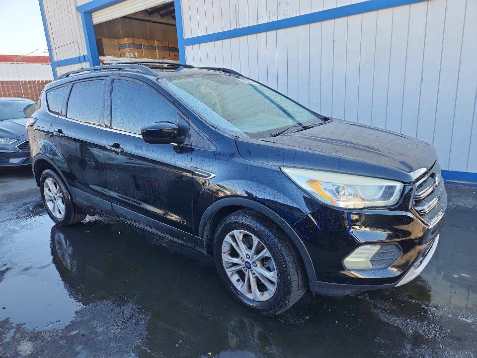 Photo 4 from auction – 2017 FORD ESCAPE with VIN 1FMCU9GD0HUB34716