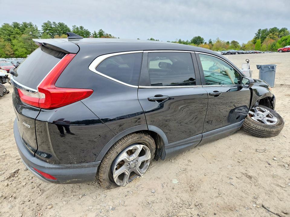 Photo 3 from auction – 2018 HONDA CR-V with VIN 7FARW2H57JE025793
