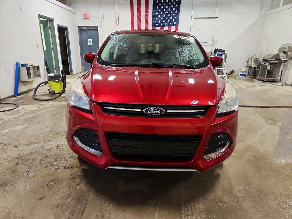 Photo 5 from auction – 2014 FORD ESCAPE with VIN 1FMCU9GXXEUD23136
