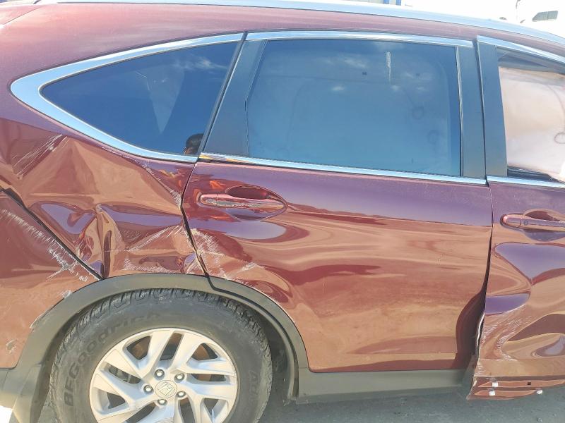 Photo 11 from auction – 2016 HONDA CR-V with VIN 2HKRM3H78GH531104