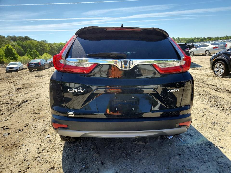 Photo 6 from auction – 2017 HONDA CR-V with VIN 2HKRW2H80HH684137