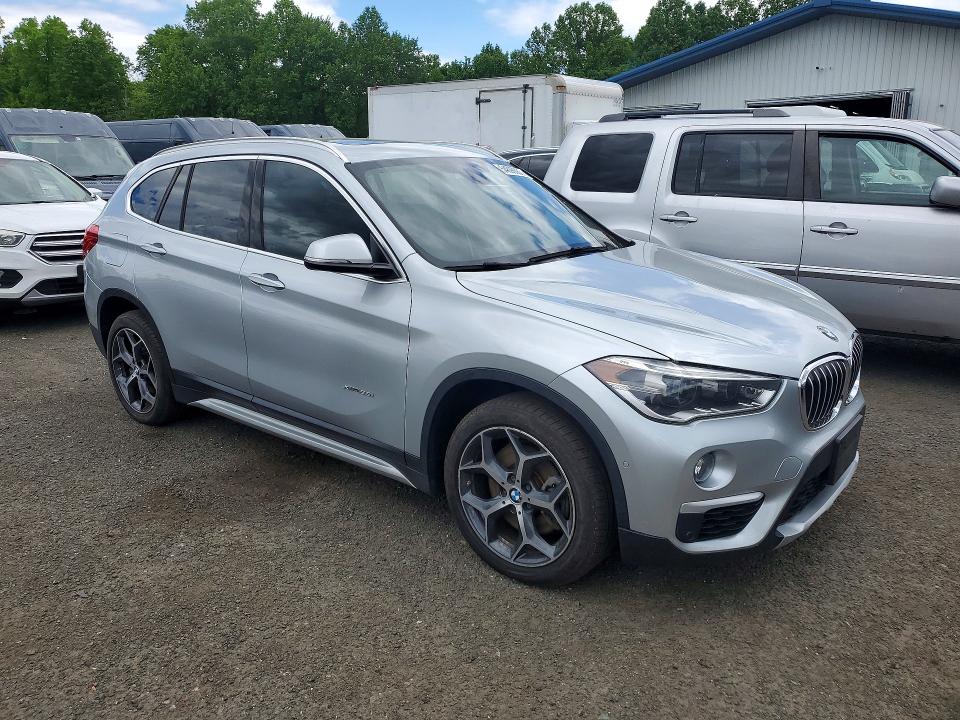 Photo 4 from auction – 2016 BMW X1 with VIN WBXHT3C31GP886321