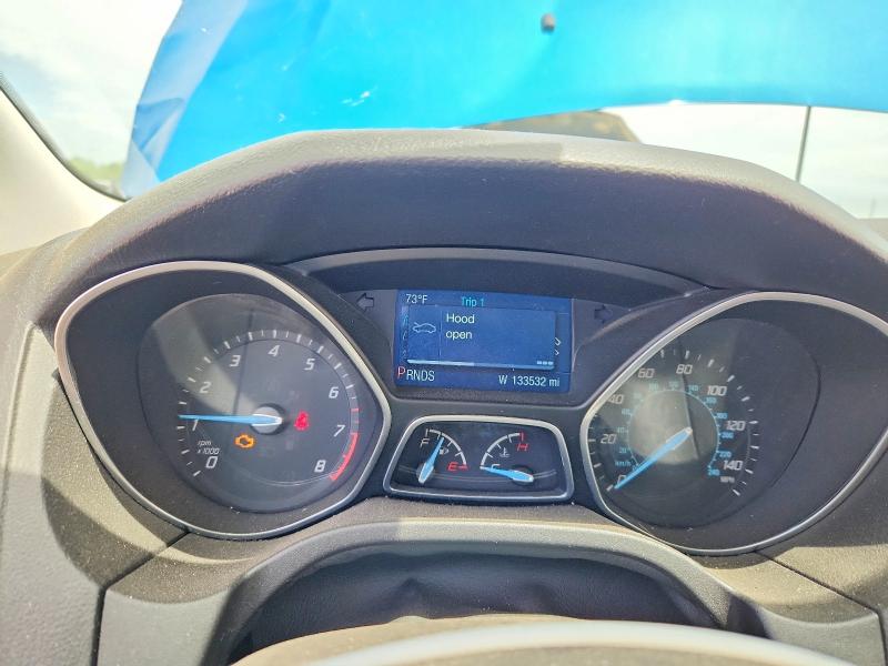 Photo 9 from auction – 2014 FORD FOCUS with VIN 1FADP3F27EL346890