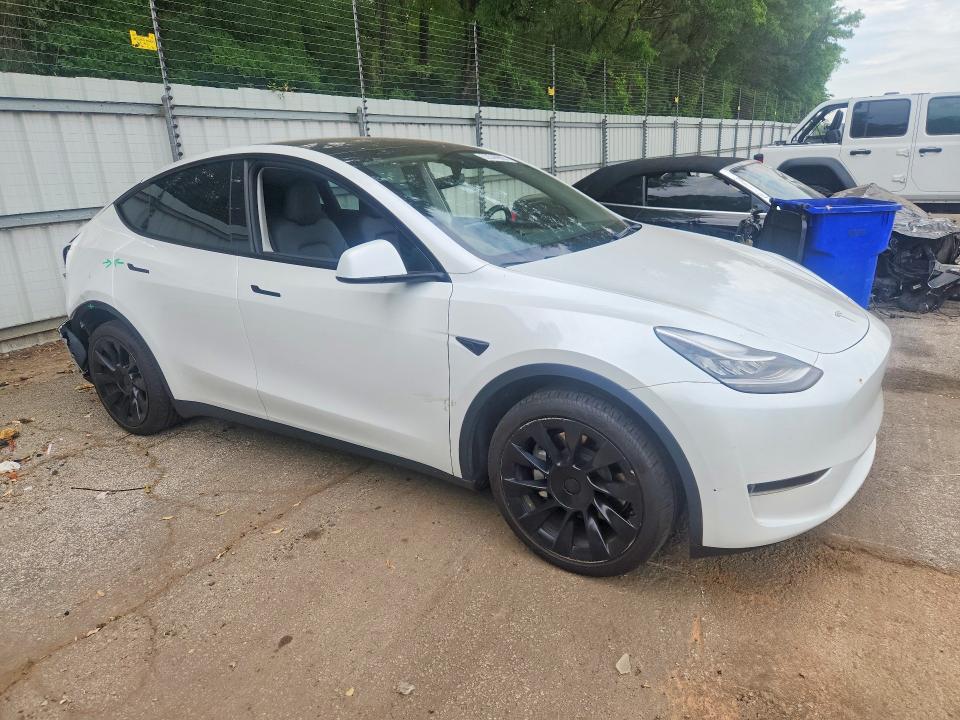 Photo 4 from auction – 2023 TESLA MODEL Y with VIN 7SAYGDEE7PA036161