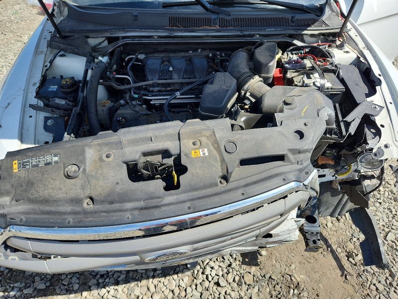 Photo 11 from auction – 2015 FORD TAURUS with VIN 1FAHP2D89FG113669