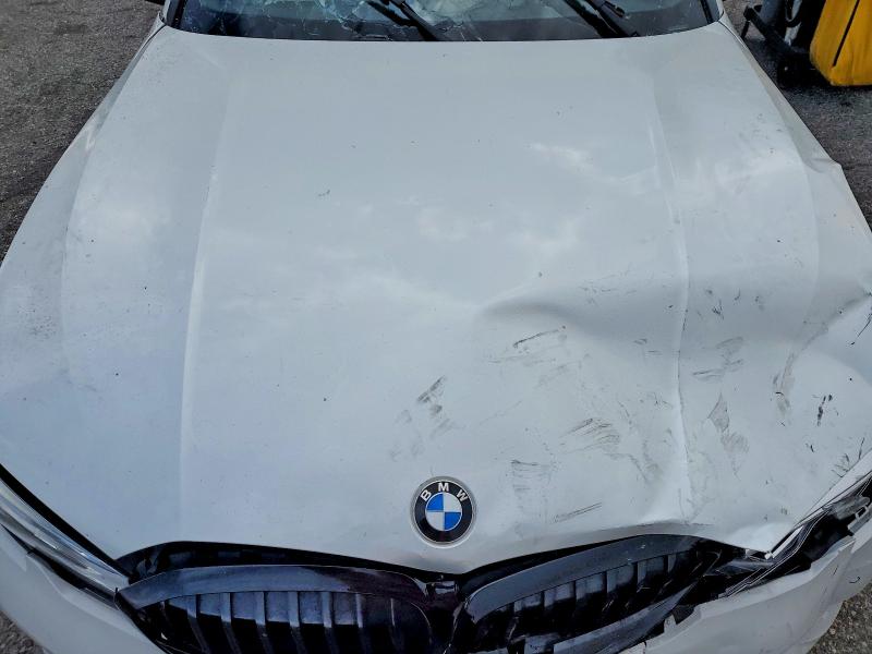 Photo 11 from auction – 2021 BMW 330I with VIN 3MW5R1J07M8B49904