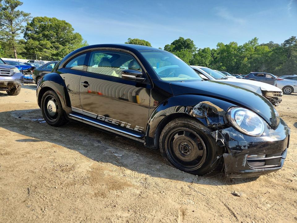 Photo 4 from auction – 2013 VOLKSWAGEN BEETLE with VIN 3VWJP7AT5DM685288