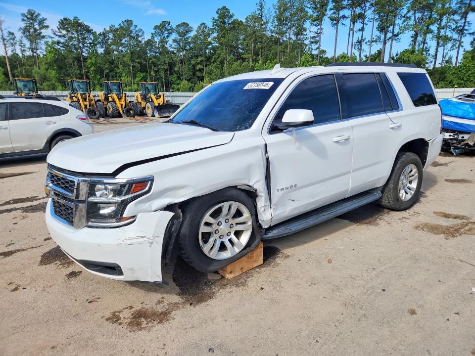 CHEVROLET TAHOE 2019 with VIN 1GNSCBKC8KR396557 - Photo from auction