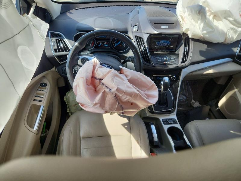 Photo 8 from auction – 2013 FORD ESCAPE with VIN 1FMCU9H99DUD80538