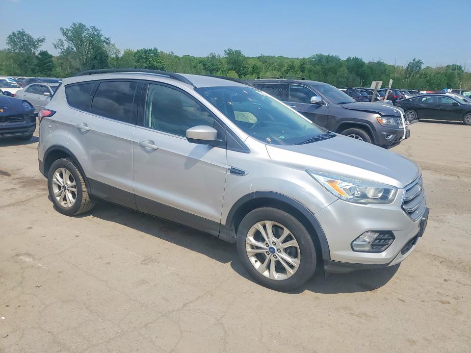 Photo 4 from auction – 2017 FORD ESCAPE with VIN 1FMCU9GD0HUC88679