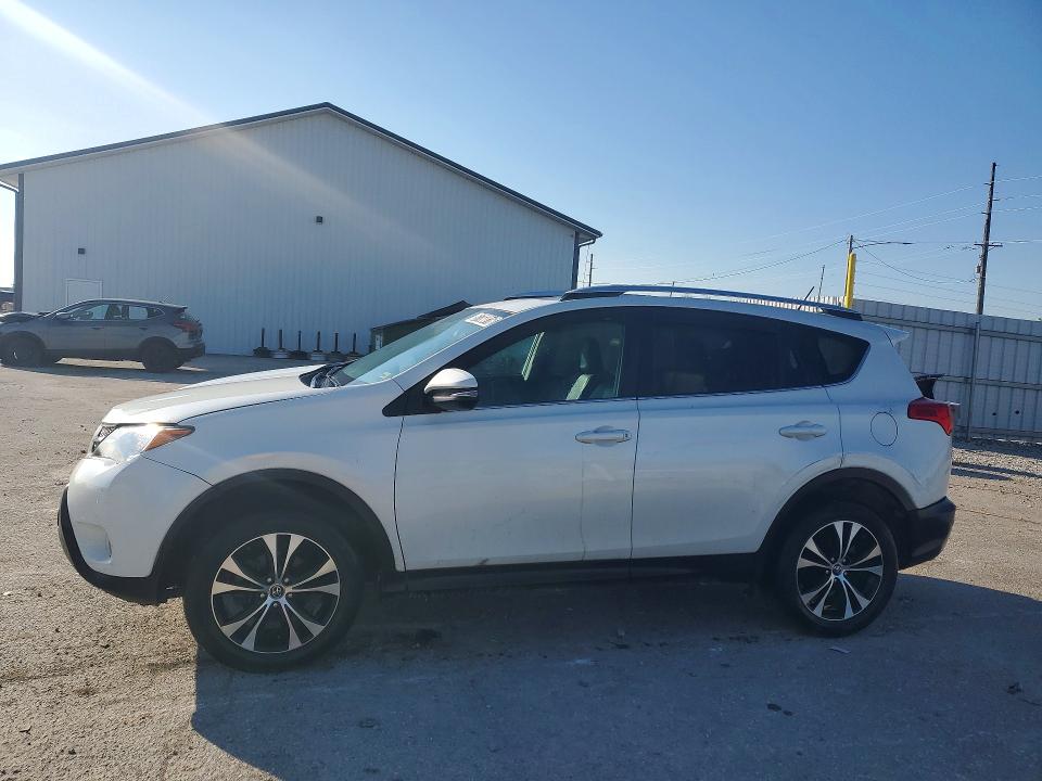 TOYOTA RAV4 2015 with VIN 2T3DFREV9FW382901 - Photo from auction