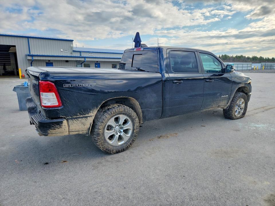 Photo 3 from auction – 2021 RAM 1500 with VIN 1C6SRFMT4MN520725