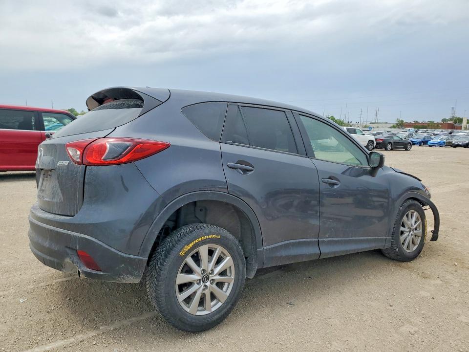 Photo 3 from auction – 2016 MAZDA CX-5 with VIN JM3KE4CY9G0921329