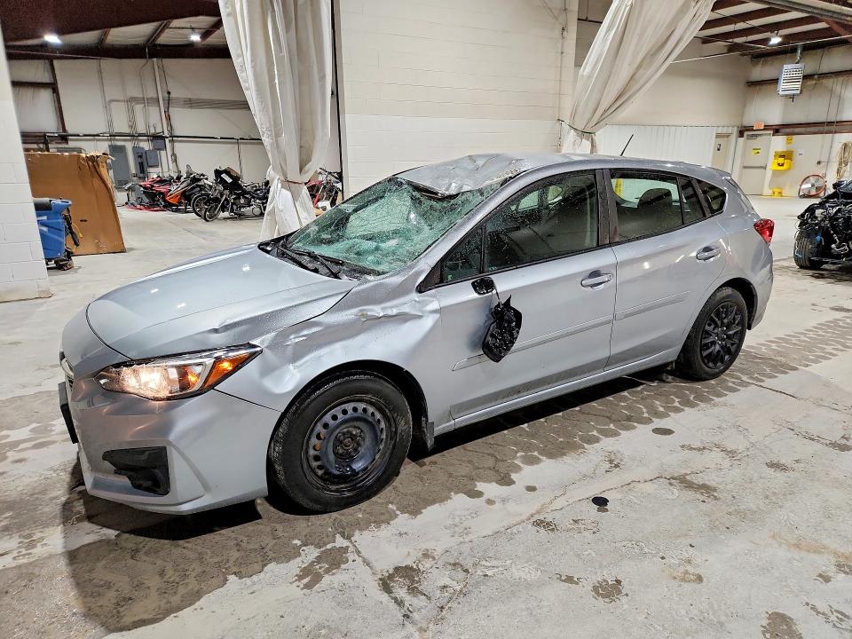 SUBARU IMPREZA 2018 with VIN 4S3GTAA66J3740876 - Photo from auction