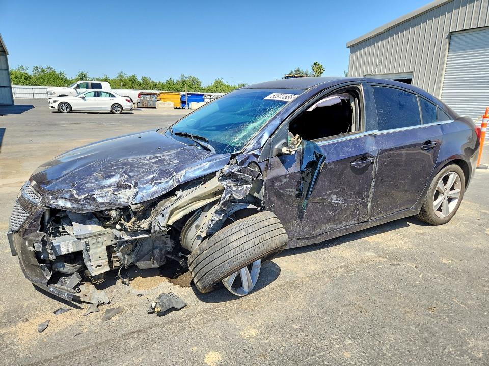 CHEVROLET CRUZE 2014 with VIN 1G1PE5SBXE7386087 - Photo from auction