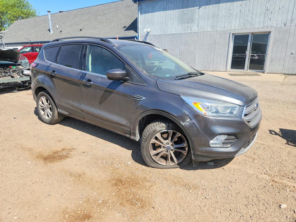 Foto 4 de la subasta – 2017 FORD ESCAPE con VIN 1FMCU9GD5HUD18193