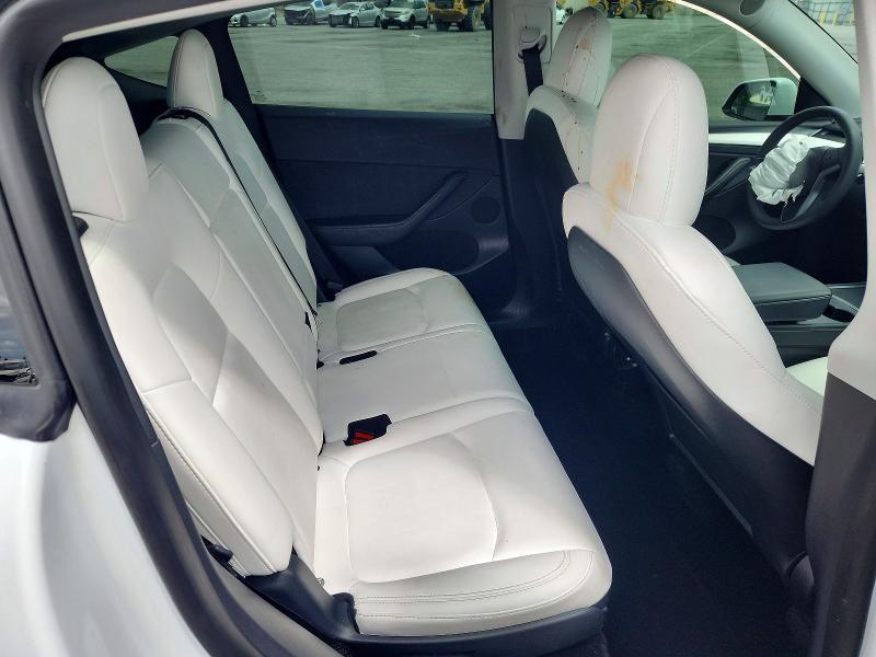 Photo 10 from auction – 2023 TESLA MODEL Y with VIN 7SAYGAEE9PF659881