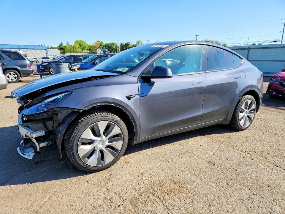 TESLA MODEL Y 2023 with VIN 7SAYGDEE4PF832210 - Photo from auction