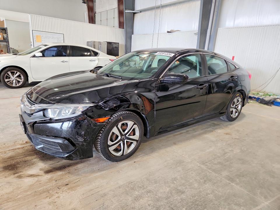 HONDA CIVIC 2018 with VIN 19XFC2E54JE018706 - Photo from auction