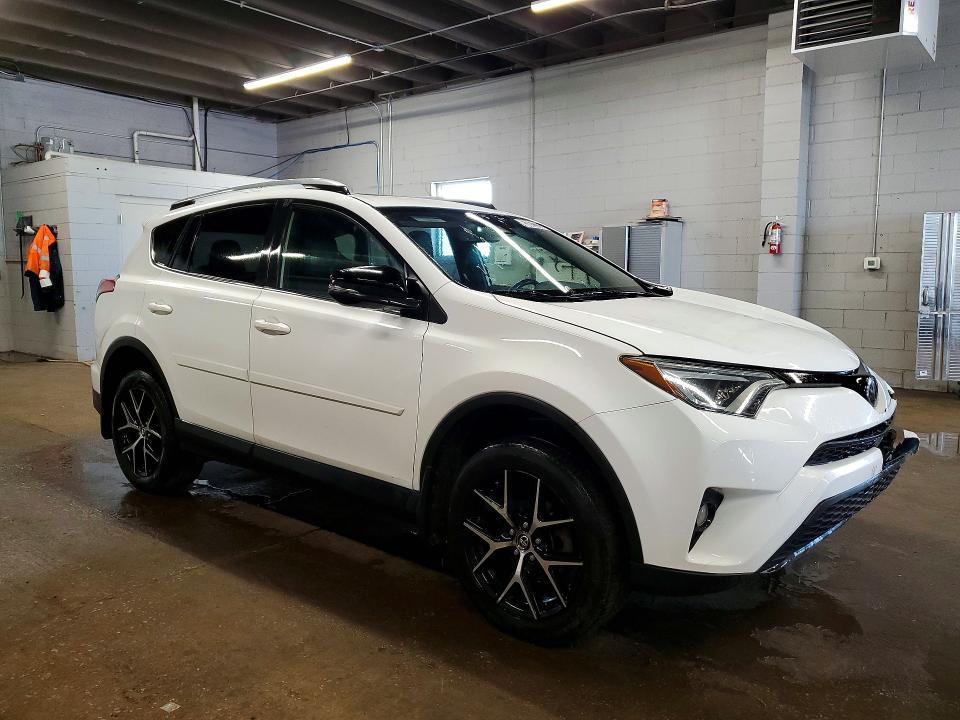Photo 4 from auction – 2018 TOYOTA RAV4 with VIN JTMJFREV9JJ745336