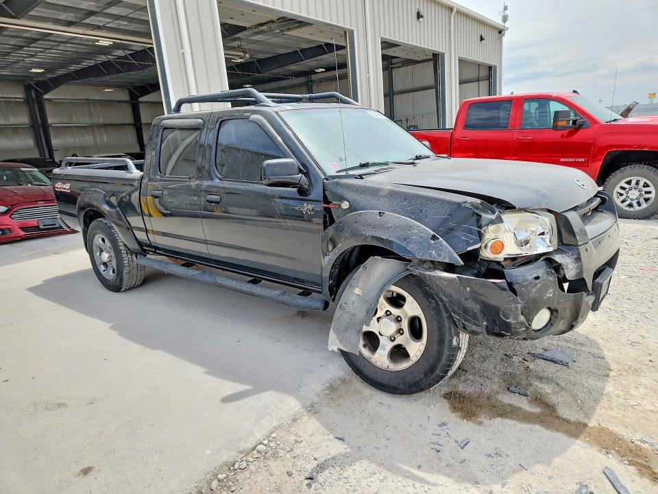 Photo 4 from auction – 2002 NISSAN FRONTIER with VIN 1N6MD29Y42C365998