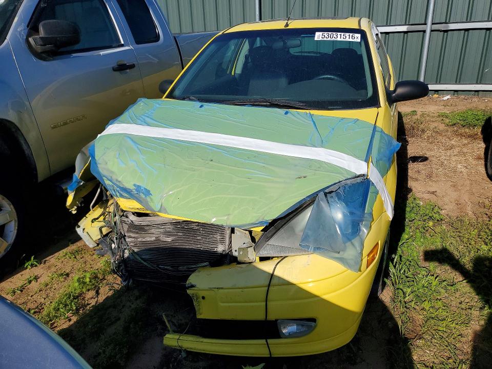 Photo 5 from auction – 2003 FORD FOCUS with VIN 3FAFP31Z93R145682